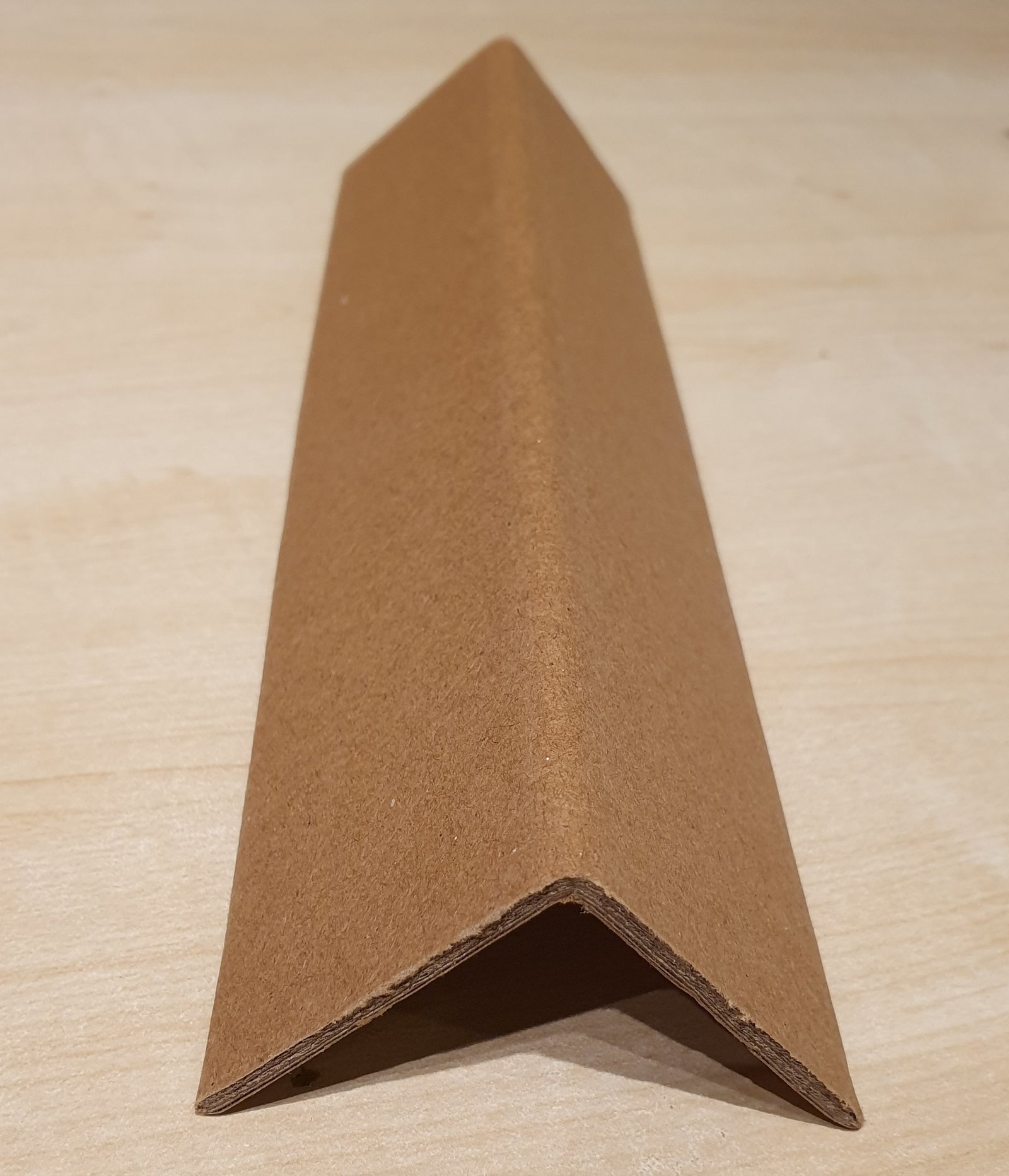 Stock photograph of a laminated cardboard angle protector
